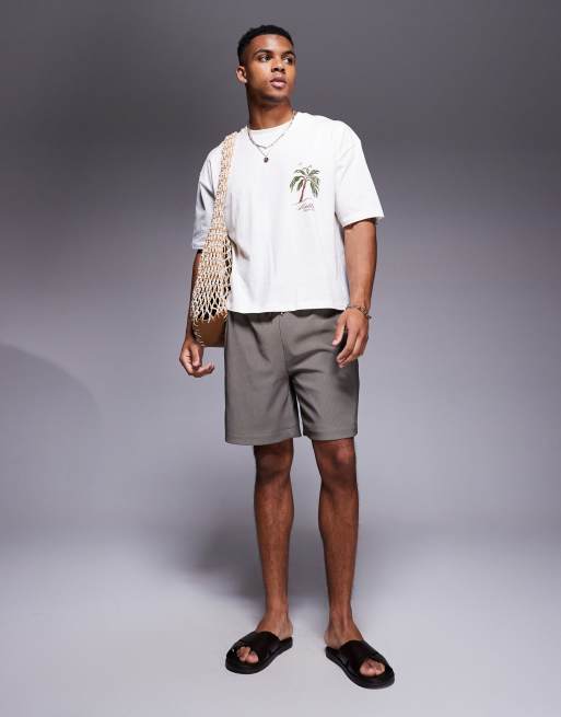 Camiseta blanco hueso de corte cuadrado extragrande con estampado gráfico de palmeras de ASOS DESIGN, 2 de 4