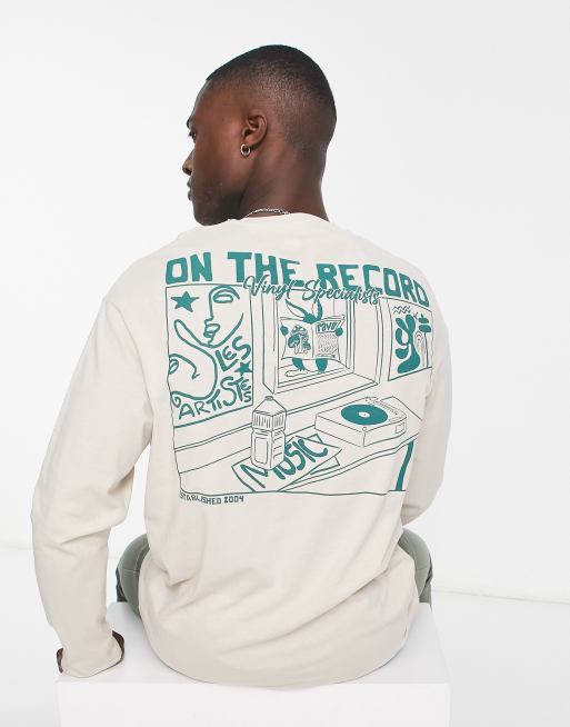 Camiseta blanco hueso extragrande de manga larga con estampado 