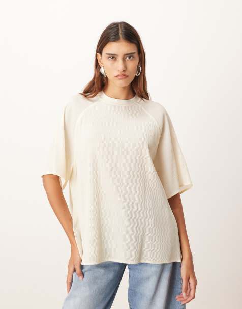 Camiseta blanco marfil con diseño híbrido, mangas raglán y acabado texturizado de ARRANGE - view 1