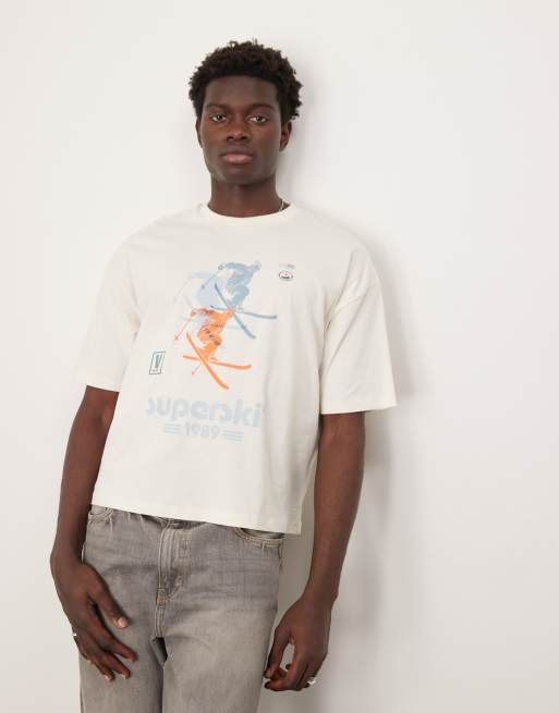 Camiseta color crema de corte cuadrado extragrande con estampado grafico de esqui de ASOS DESIGN