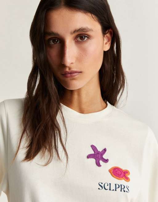 Camiseta color crudo con detalle de croché de Scalpers