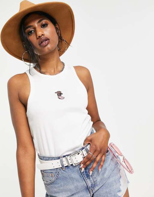 Camiseta color crudo sin mangas con bordado de vaquero de canalé de ASOS DESIGN