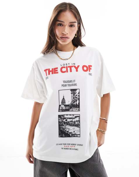 Camiseta color leche de coco extragrande con estampado gráfico de ciudad de ASOS DESIGN - view 1