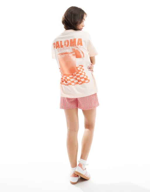 Camiseta color melocotón extragrande con estampado gráfico 