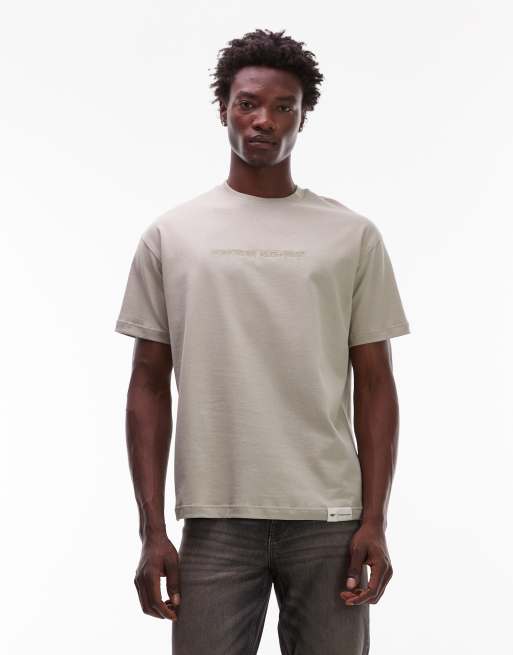 Camiseta color piedra de corte suelto con logo bordado de tejido de 180 g/m² WWR de CAT