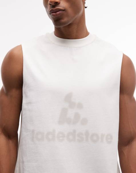 Camiseta color tiza sin mangas de corte cuadrado con logo de Faded Store - view 1