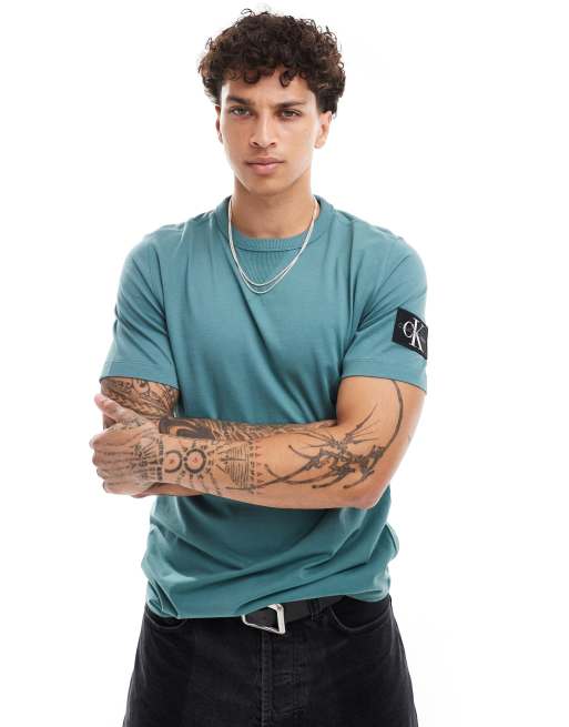 Camiseta color turquesa con parche de Calvin Klein Jeans