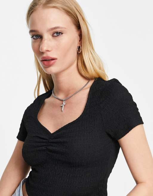 Camiseta escote corazon clearance