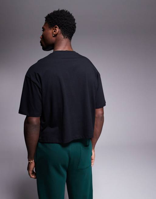 Camiseta corta negra extragrande con estampado deportivo en el pecho de ASOS DESIGN, 3 de 4