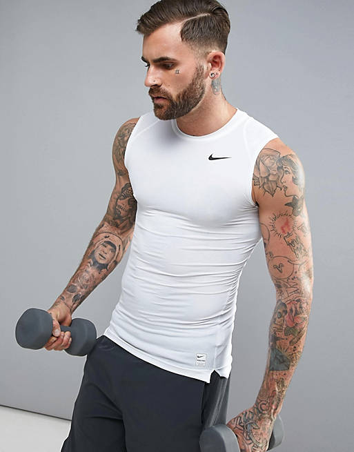 síndrome Acuario carro Camiseta de compresión sin mangas blanca 703092-100 de Nike Training | ASOS