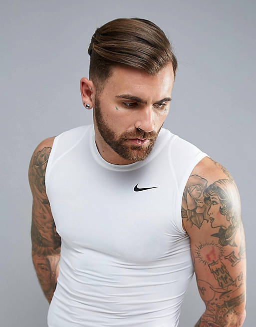 síndrome Acuario carro Camiseta de compresión sin mangas blanca 703092-100 de Nike Training | ASOS