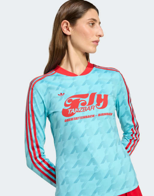 Camiseta de fútbol azul luminoso ajustada de manga larga con