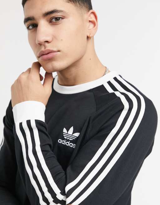 Camiseta de manga larga negra con rayas adicolor de adidas | ASOS