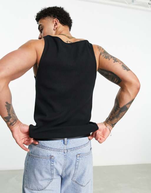 Camiseta de tirantes negra de canalé con diseño ajustado de ASOS DESIGN, 2 de 4