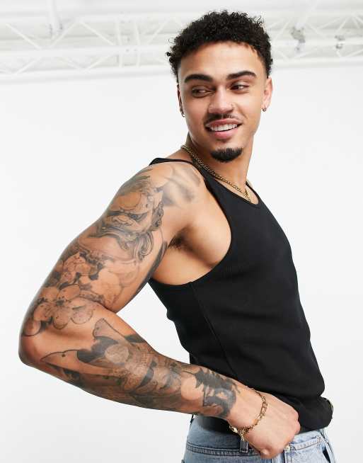 Camiseta de tirantes negra de canalé con diseño ajustado de ASOS DESIGN, 4 de 4