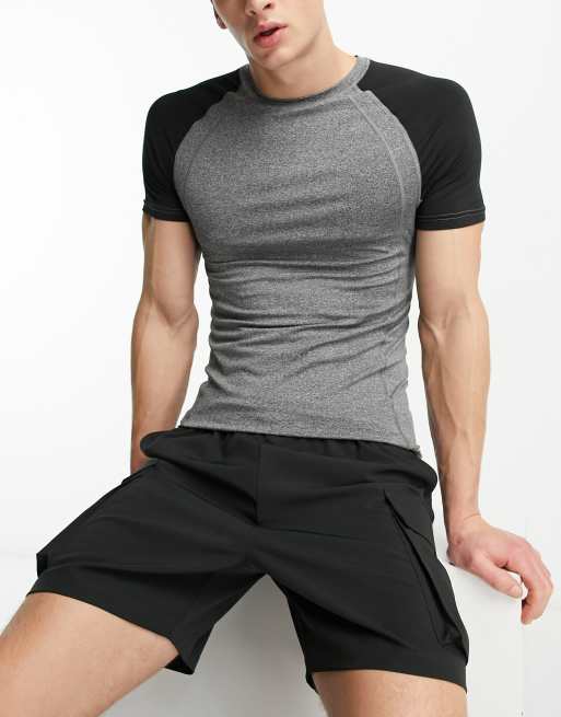 Camiseta deportiva ajustada con mangas en contraste de ASOS 4505