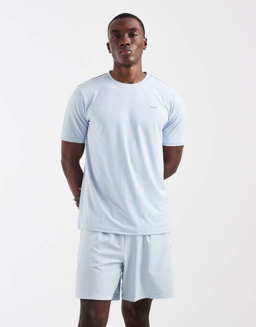 Camiseta deportiva azul claro con logo estampado en la espalda de CAPO (parte de un conjunto), 2 de 5