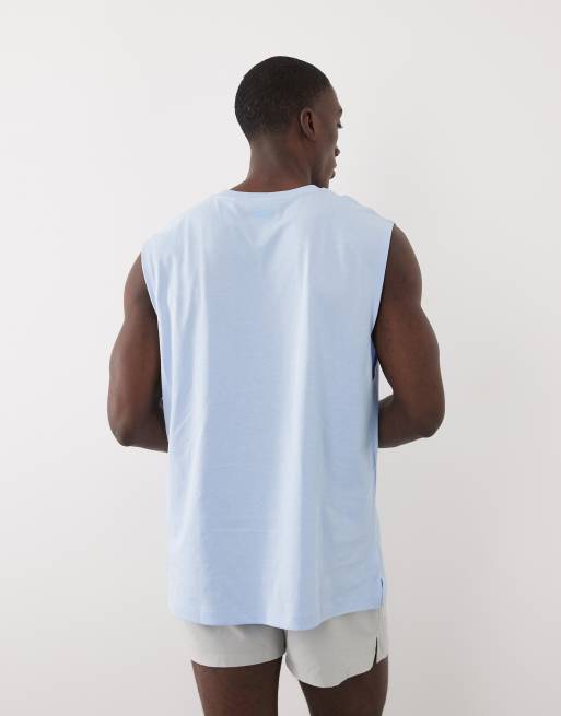 Camiseta deportiva azul claro extragrande sin mangas con acabado de secado rápido de algodón Icon de 4505, 3 de 5