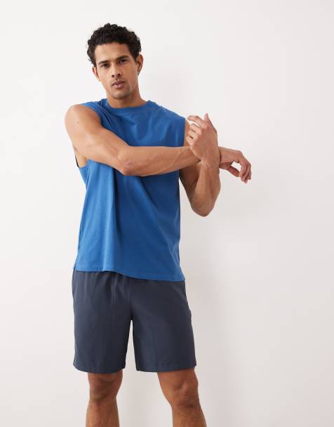 Camiseta deportiva azul lavado extragrande sin mangas con acabado de secado rápido de algodón Icon de 4505 - view 1