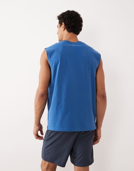 Camiseta deportiva azul lavado extragrande sin mangas con acabado de secado rápido de algodón Icon de 4505, 5 de 5