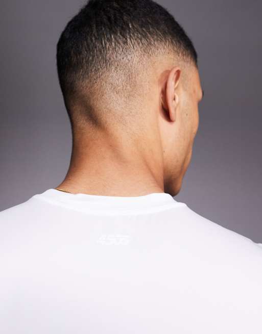 Camiseta deportiva blanca ajustada sin mangas de tejido de secado rápido Icon de 4505 , 2 de 4