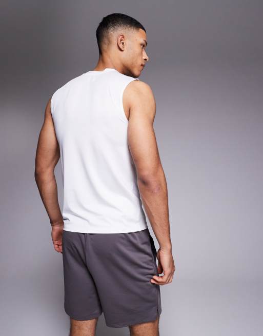 Camiseta deportiva blanca ajustada sin mangas de tejido de secado rápido Icon de 4505 , 3 de 4