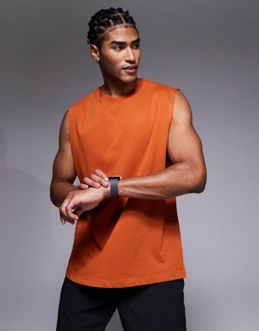 Camiseta deportiva color terracota extragrande sin mangas con acabado de secado rápido de algodón Icon de 4505