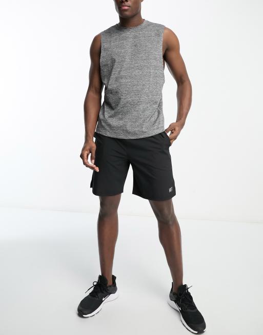 Camiseta deportiva gris jaspeado sin mangas con sisas caídas de HIIT, 3 de 4