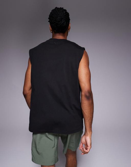 Camiseta deportiva marrón lavado extragrande sin mangas con acabado de secado rápido de algodón Icon de 4505, 5 de 5