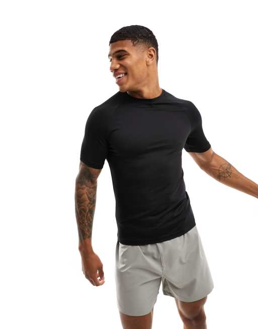 Camiseta deportiva negra ajustada de tejido de secado rápido Icon de 4505  