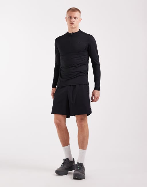 Camiseta deportiva negra de manga larga con cremallera corta de CAPO, 2 de 5