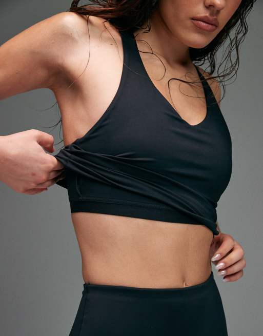 Camiseta deportiva negra sin mangas con sujetador integrado push up de 4505, 4 de 5