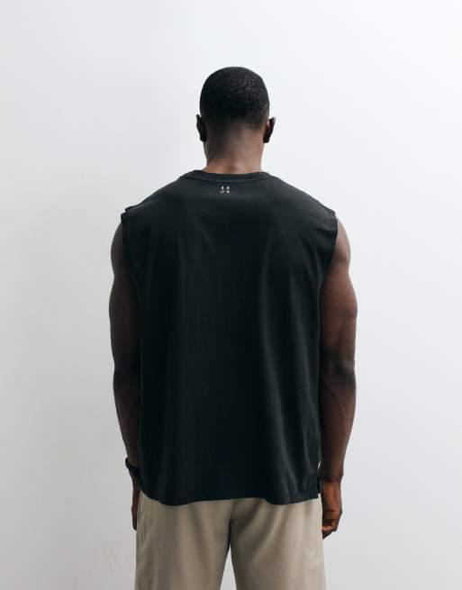 Camiseta deportiva negro lavado extragrande sin mangas con acabado de secado rápido de algodón Icon de 4505, 5 de 5