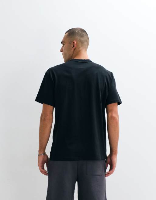 Camiseta extragrande negra básica Premium de Nike, 5 de 5