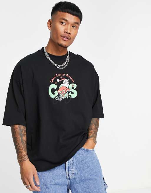 Camiseta extragrande negra con estampado navideño de ASOS DESIGN
