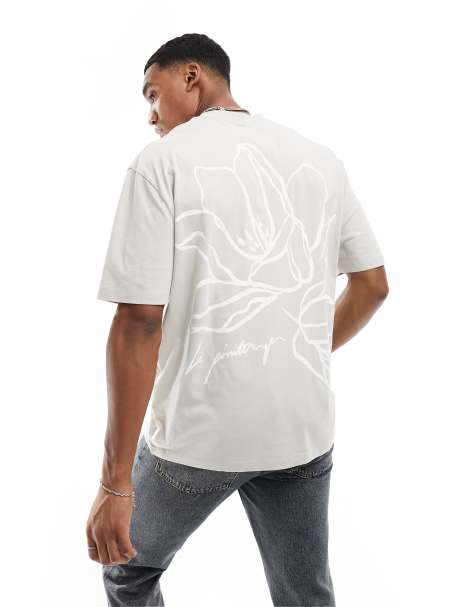 Camiseta gris con estampado floral en la espalda de ASOS DESIGN - view 1