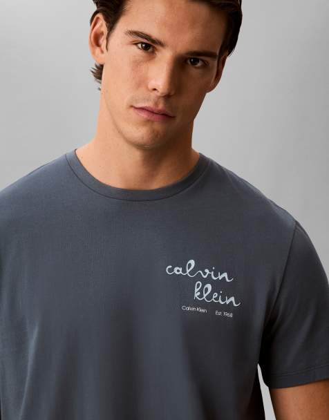 Camiseta gris con logo en el pecho de Calvin Klein Jeans - view 1