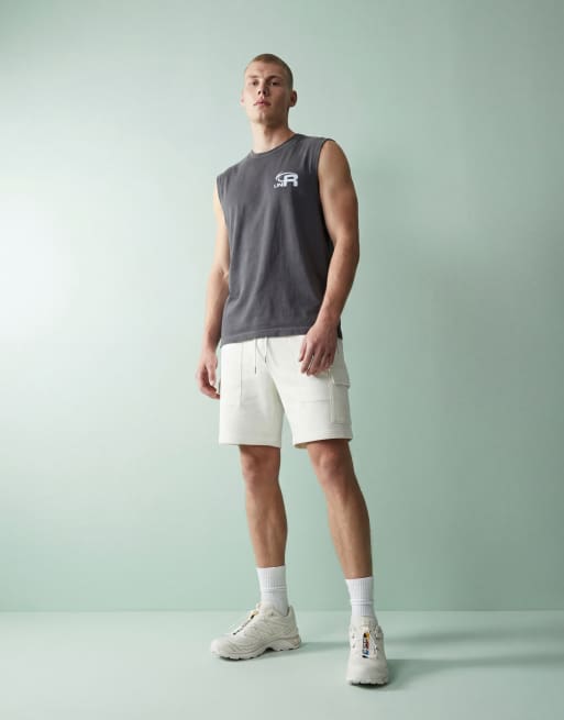 Camiseta gris lavado extragrande sin mangas con estampado gráfico de texto de tejido grueso de ASOS DESIGN, 9 de 12