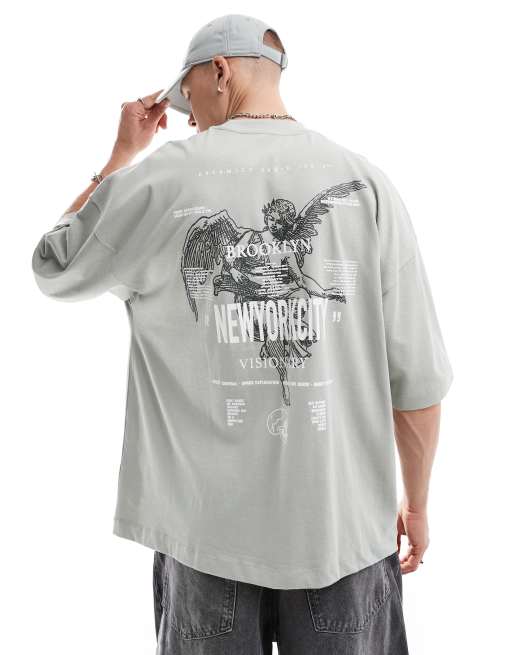 Camiseta gris lavado muy extragrande con estampado de ciudad y querubín en el pecho y la espalda de ASOS DESIGN
