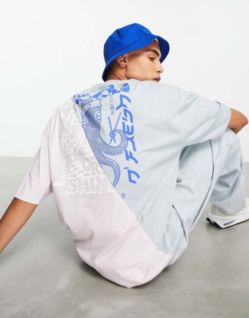 Camiseta gris y azul extragrande con diseño color block y estampado de dibujos en la espalda de ASOS DESIGN