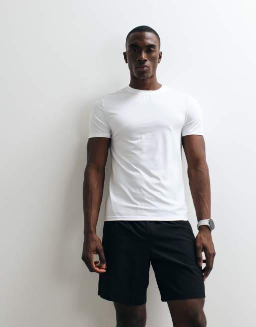 Camiseta interior deportiva blanca ajustada de tejido de secado rápido Icon de 4505, 3 de 5
