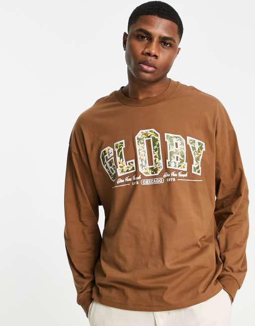 Camiseta marrón extragrande de manga larga con estampado de flores estilo universitario en el pecho de ASOS DESIGN 