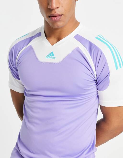 Camiseta morada con diseño de paneles color block de adidas Training