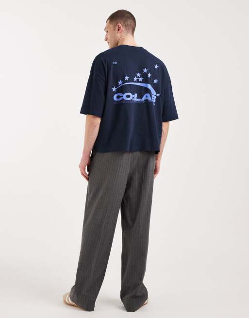 Camiseta morada de corte cuadrado extragrande con estampado gráfico urbano de texto de ASOS DESIGN, 2 de 5