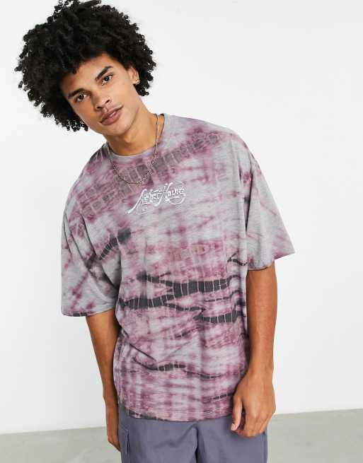 Camiseta morada extragrande con lavado grunge y estampado en el pecho de ASOS DESIGN