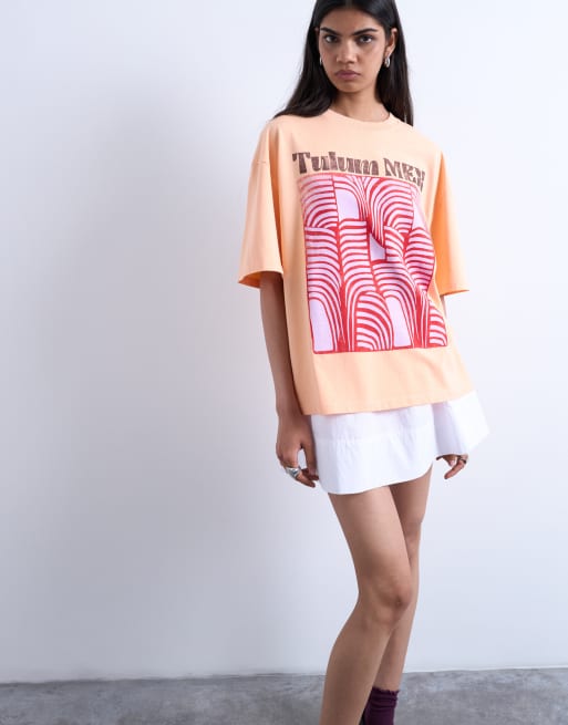 Camiseta naranja extragrande con ribetes y estampado gráfico de 