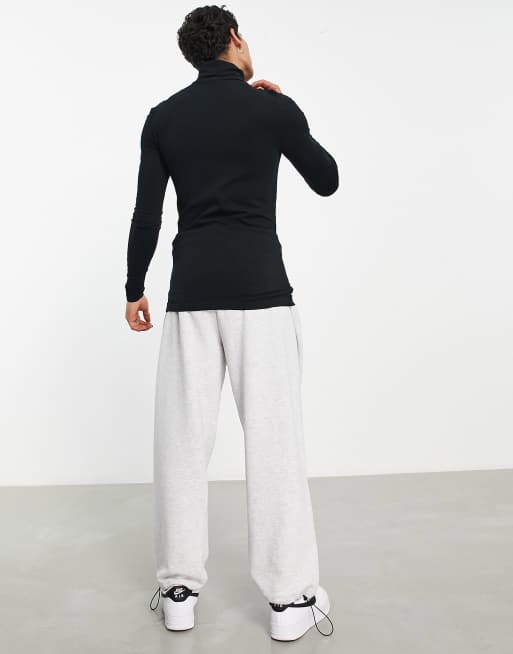 Camiseta negra ajustada de manga larga con cuello vuelto de punto de ASOS DESIGN, 2 de 4