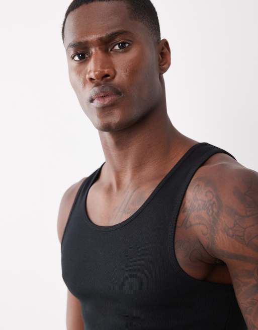 Camiseta negra ajustada sin mangas con cuello ancho medio de canalé de ASOS DESIGN, 2 de 5