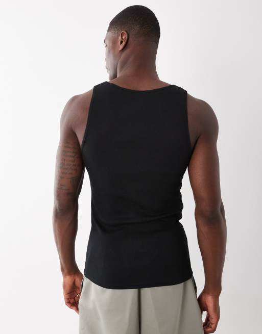 Camiseta negra ajustada sin mangas con cuello ancho medio de canalé de ASOS DESIGN, 4 de 5