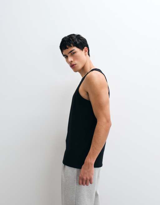 Camiseta negra básica de tirantes y corte estándar Essentials de ASOS DESIGN, 4 de 5